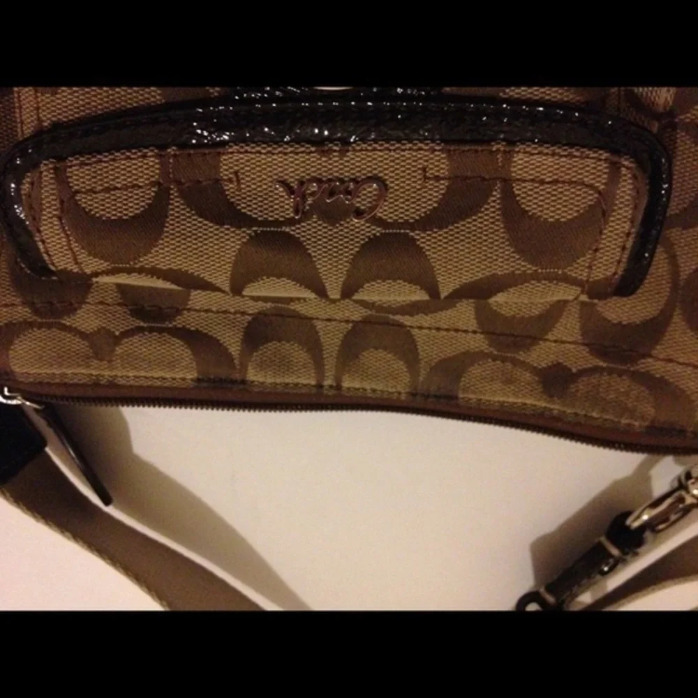 COACH signature c brown crossbody turnlock bag